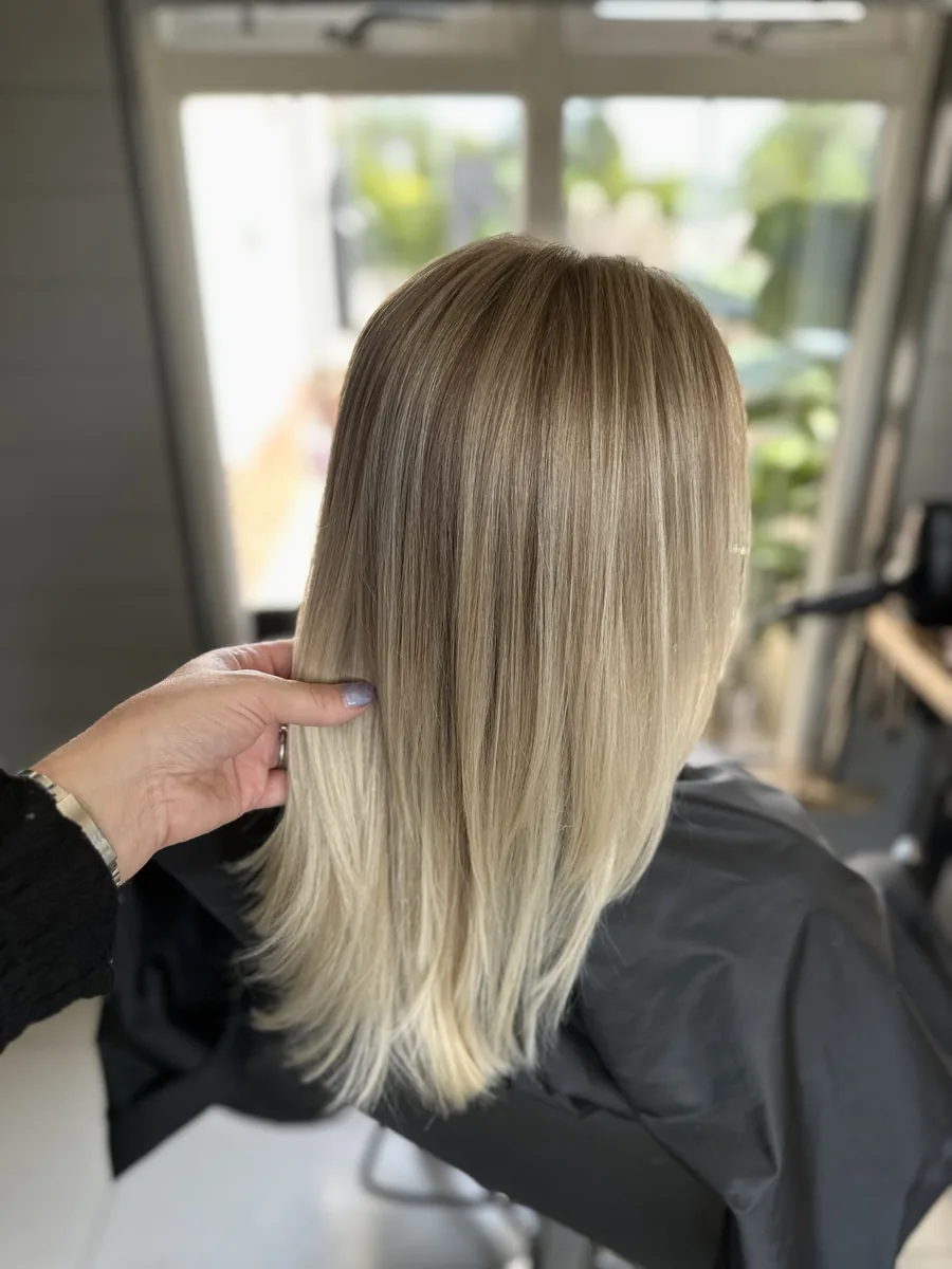 After: blonde with dark roots blended to a soft, ash blonde with a smooth finish