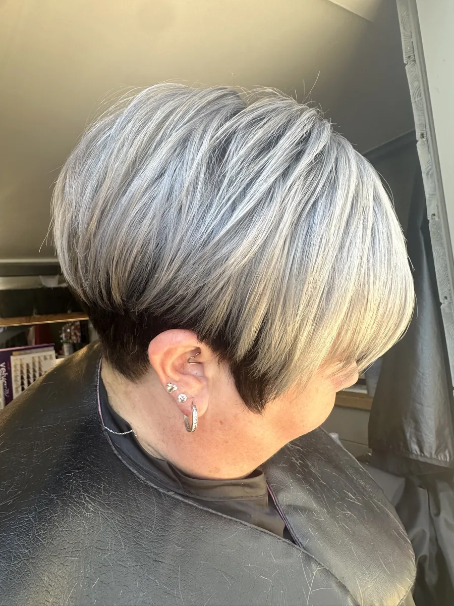 Silver pixie cut with a dark undercut