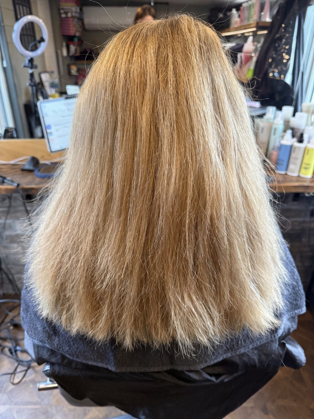 Before: dry, brassy blonde refreshed to a warm, glossy lived-in blonde